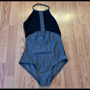 Gray and black open back high neck leotard